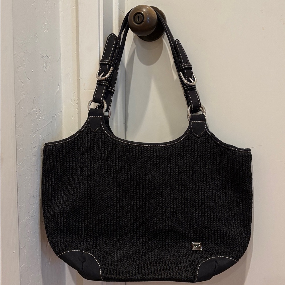 The Sak Black Dual Handle Crochet Shoulder Bag
Has a middle zipper compartment